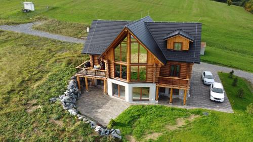 an overhead view of a log home with a roof at Chalet Liptov in Ižipovce