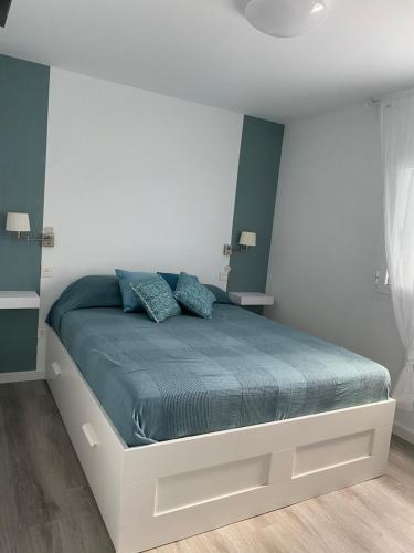 Postel nebo postele na pokoji v ubytování Villa Clau
