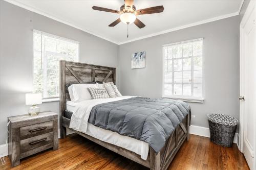 a bedroom with a bed and a ceiling fan at Stylish, Tranquil & Comfy ~ Queen Beds ~ Pkg in Detroit