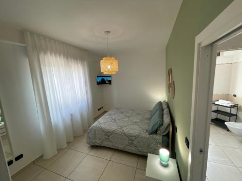 Ein Bett oder Betten in einem Zimmer der Unterkunft B&B Irpinia Relais