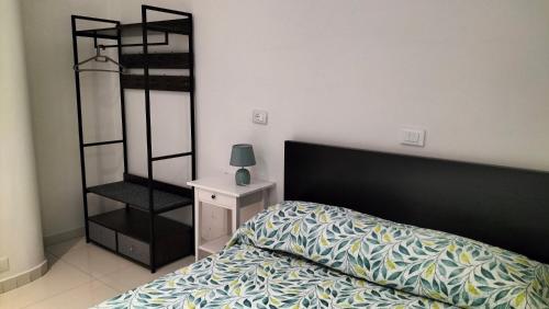 Ein Bett oder Betten in einem Zimmer der Unterkunft THE HOUSE FIERA di ROMA