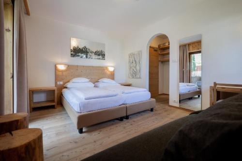 Postel nebo postele na pokoji v ubytování Rooms Kronblick