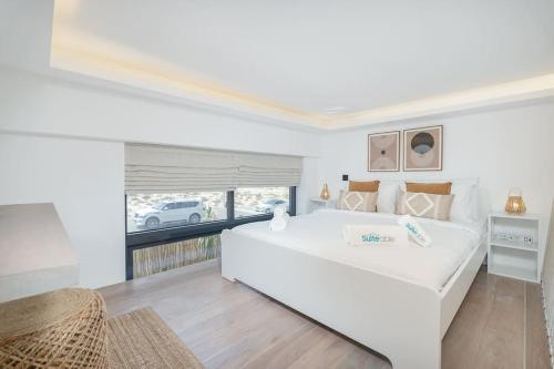 Postel nebo postele na pokoji v ubytování Charming Loft with Spacious Terrace in JVC