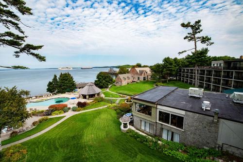 an aerial view of a house and the water at Holiday Inn Bar Harbor Regency Hotel, an IHG Hotel in Bar Harbor