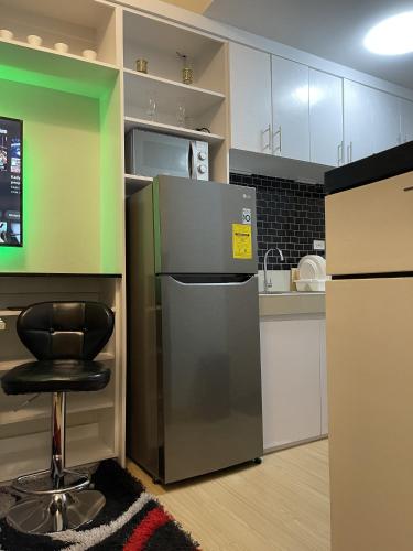 Una cocina o cocineta en Whole Condo with Pool Great for Staycation