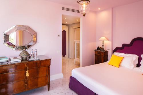 Katil atau katil-katil dalam bilik di Boutique Hotel Don Alfonso 1890