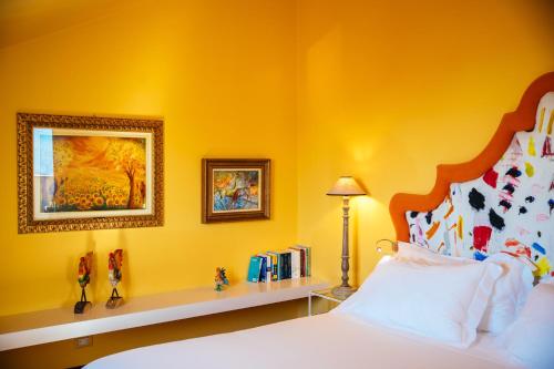 Katil atau katil-katil dalam bilik di Boutique Hotel Don Alfonso 1890