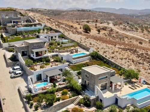 an aerial view of a villa in a desert at Stelani Villas & Suites in Kalamaki