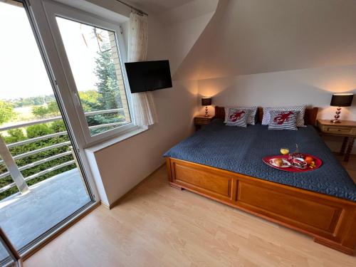 Postel nebo postele na pokoji v ubytování Willa Edi