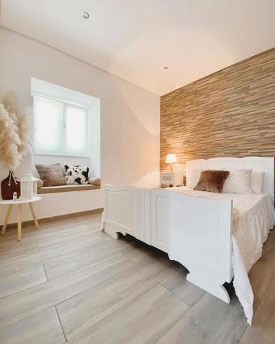 Postel nebo postele na pokoji v ubytování Casa dos Avós
