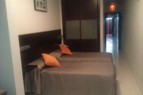 Säng eller sängar i ett rum på Casa de Larios