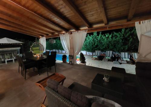 a living room with a couch and a table at Villa Susann in Šibenik