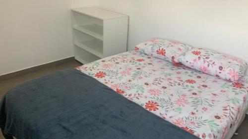 Cama o camas de una habitación en Apartamento no Tremembé/ 2 dormitórios