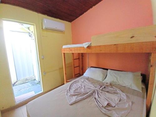 Ένα ή περισσότερα κρεβάτια σε δωμάτιο στο Hostel Sol da Barra