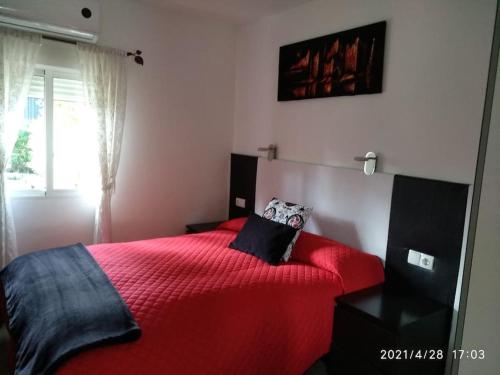 Ένα ή περισσότερα κρεβάτια σε δωμάτιο στο Casita de invitados cerca de Madrid