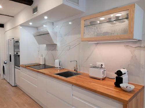 Kuchyň nebo kuchyňský kout v ubytování Apartamento con encanto en centro histórico Lugo -TineriaLucusHome