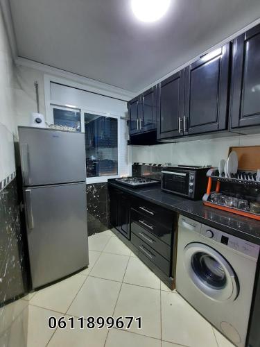 Una cocina o zona de cocina en اقامة سهيلة