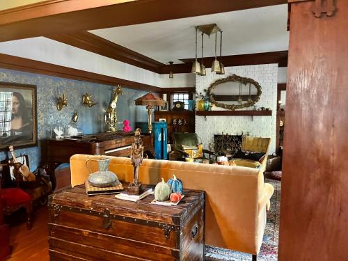 a living room with a couch and a table at Harbinson House in Sacramento