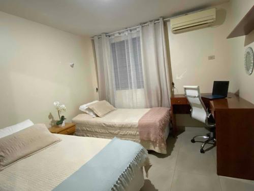 Cama o camas de una habitación en Dormitorios Familiares para Disfrutar Final de Copa Libertadores