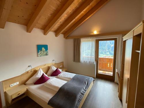 Posteľ alebo postele v izbe v ubytovaní Appartements Am Burgsee