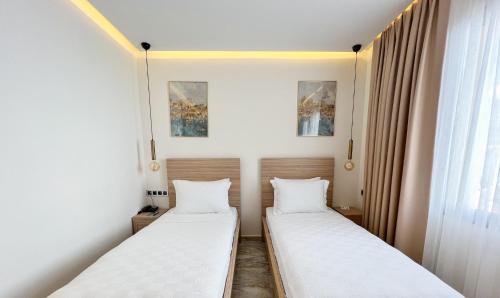 Katil atau katil-katil dalam bilik di Dna Hotel Dalyan