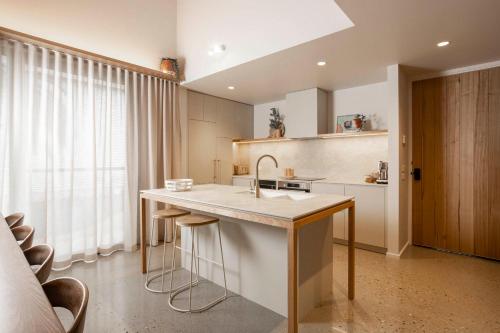 a kitchen with a sink and a counter top at John and Jane's Beechworth in Beechworth
