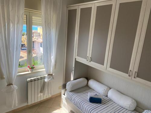 Una cama o camas en una habitación de La Terrazza di Pollon