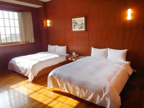 Postel nebo postele na pokoji v ubytování Meteor Garden B&B