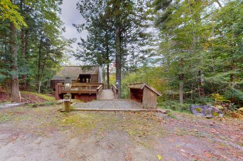 a house in the middle of a forest at The Pond House in Plymouth