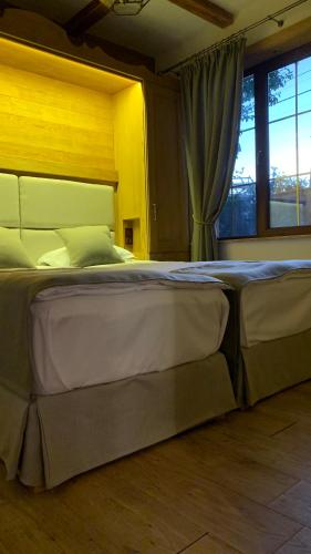 Ein Bett oder Betten in einem Zimmer der Unterkunft Chalet Bakuriani
