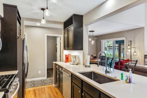 a kitchen with a sink and a stove at Aspen Getaway in Edwards