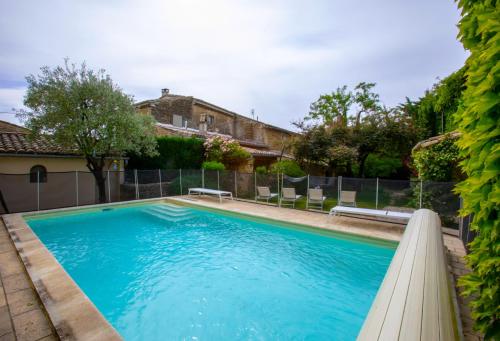 Photo de la galerie de l'établissement Maison du bonheur 10pers Piscine Privee et Chauffee, à Grignan