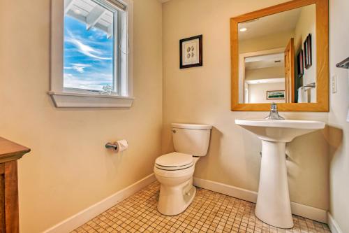 a bathroom with a toilet and a sink at Croatan Ridge 940 in Buxton