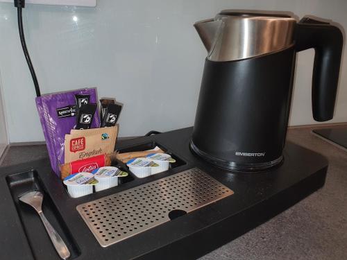 a coffee maker sitting on top of a counter at The Annex in Bristol