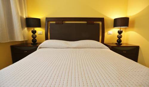 Llit o llits en una habitació de Apartment Vasco de Gama