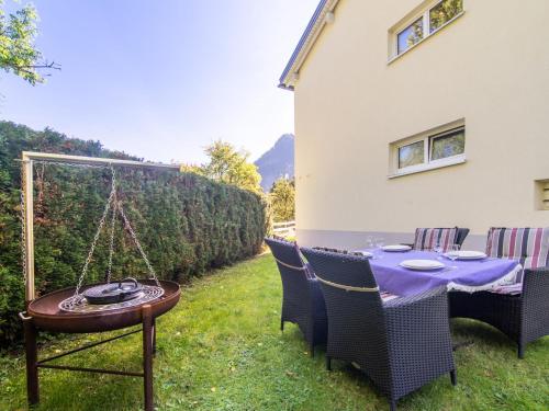 a table and chairs in the yard of a house at Schallert in Bürserberg