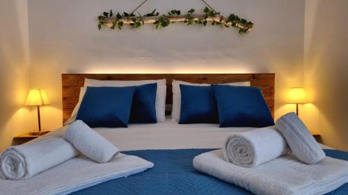 Una cama o camas en una habitación de La Terrazza dei Nonni