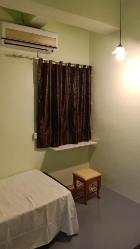 Ένα ή περισσότερα κρεβάτια σε δωμάτιο στο Snoopy homestay Two Bedroom