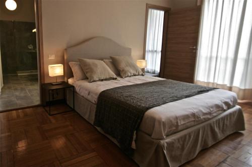 Llit o llits en una habitació de Milano Brera Relais