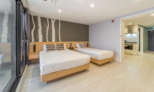Postel nebo postele na pokoji v ubytování Arte Resort Spa & Pool Villa