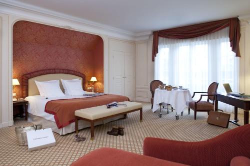 Le Domaine des Roches, Hotel & Spa tesisinde bir odada yatak veya yataklar