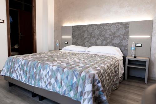 Postel nebo postele na pokoji v ubytování Hotel Casa Tra Noi