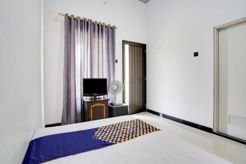 Galeriebild der Unterkunft Hotel O Rumah Kost Gresik Syariah in Gresik