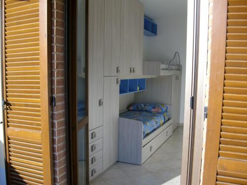 Η κουζίνα ή μικρή κουζίνα στο La Loggina Maxi con 2 giardini recintati privati
