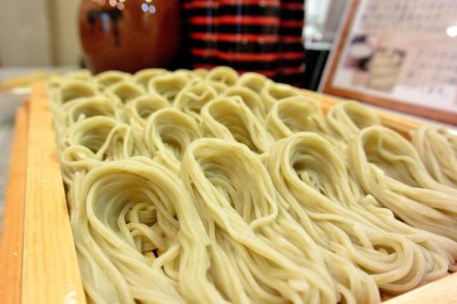 a bunch of uncooked noodles on a cutting board at Hotel Hokke Club Niigata Nagaoka in Nagaoka
