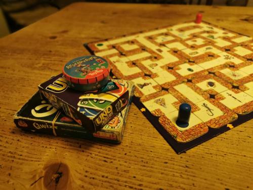 a wooden table with a board game on a table at Boslodge 84 in Vorden