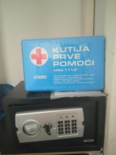a box is sitting on top of a hospitaliazep at Apartment Valentino in Vabriga