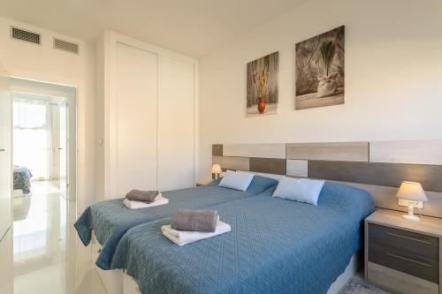 Postel nebo postele na pokoji v ubytování Classy Holiday Home