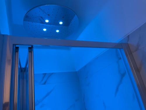 a blue light on top of a ceiling at Suite Albatros - Luxury Room in Bisceglie