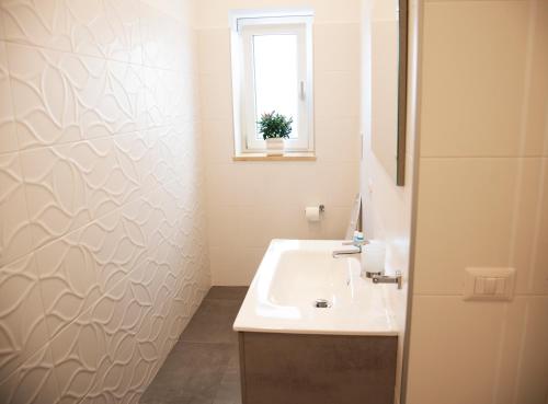 A bathroom at Perla Vacanza